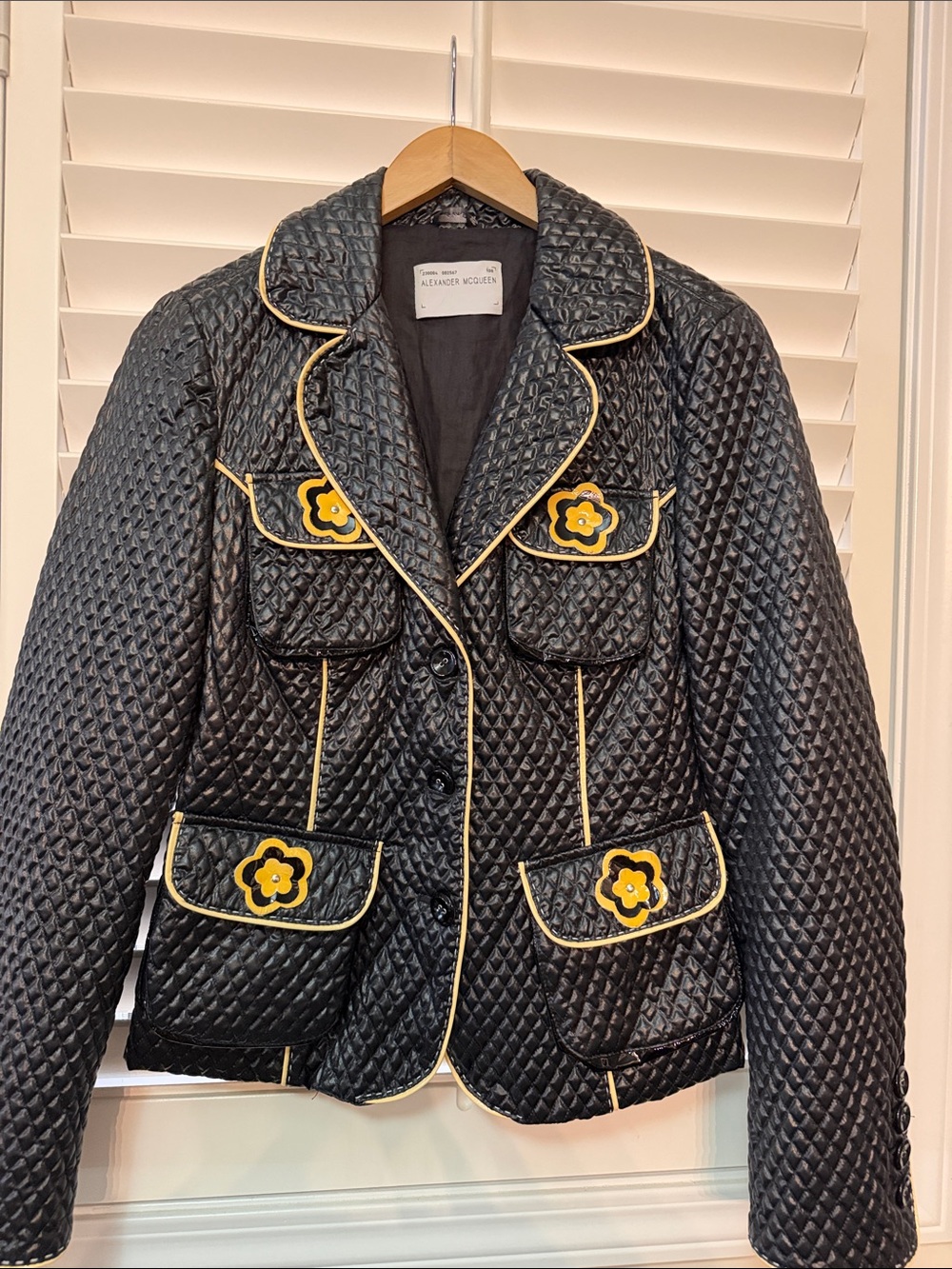 Alexander McQueen Black Quilted Jacket with Yellow Flower Accents